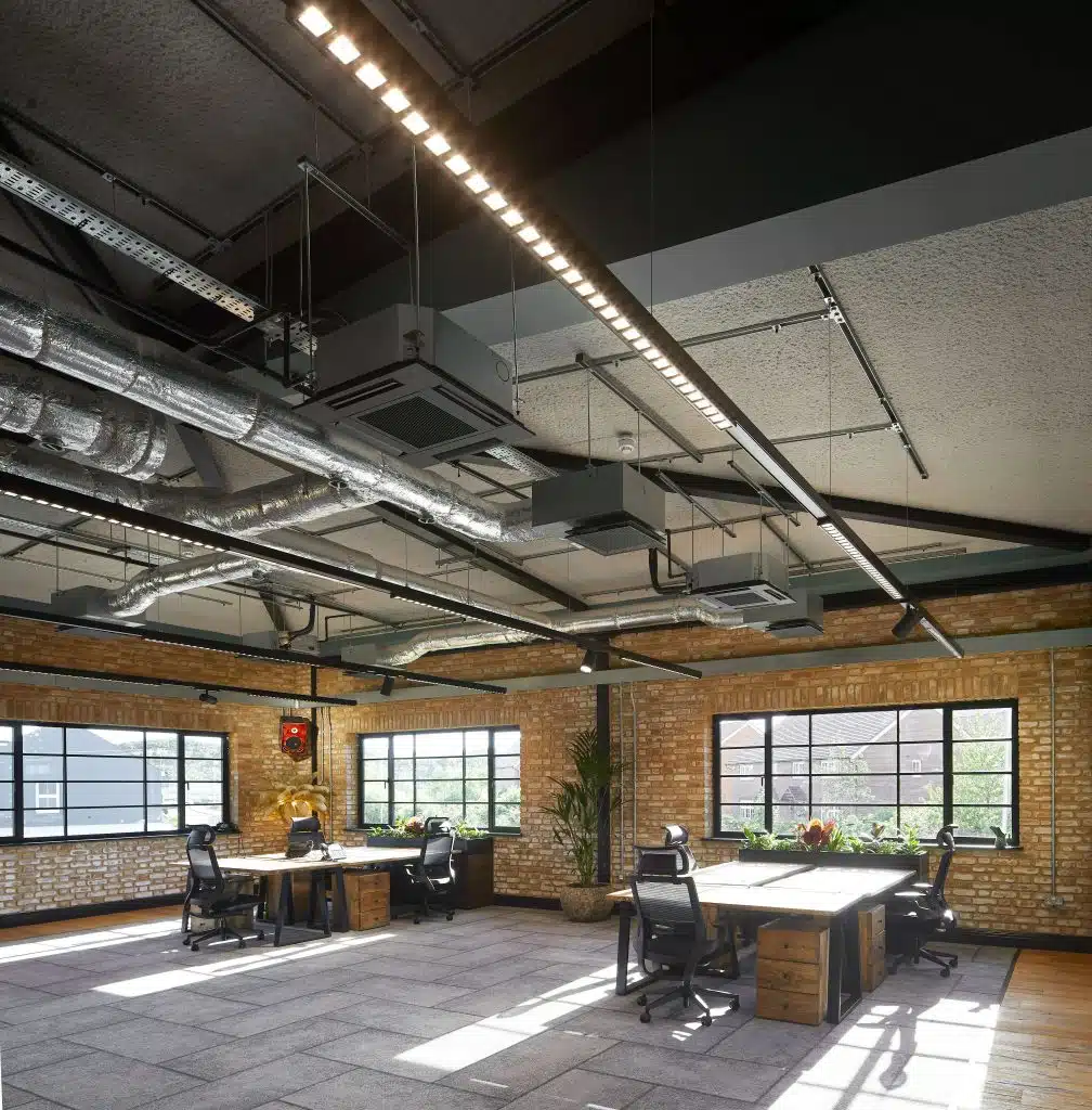 SonaSpray K-13 Special acoustic ceiling spray in light grey for a sprayed concrete look. ©Hufton+Crow.