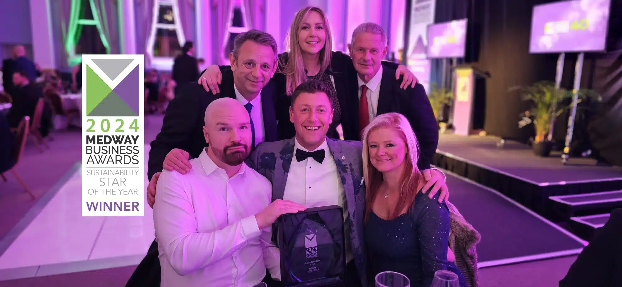 Oscar Acoustics staff celebrating winning Sustainability Star of the Year Award at the 2024 Medway Business Awards.