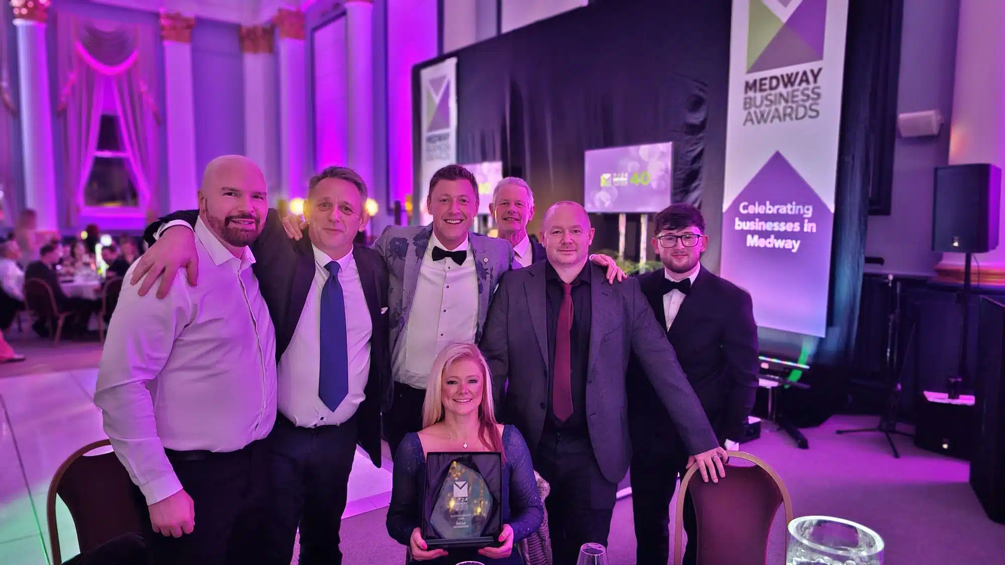 Oscar Acoustics staff celebrating winning Sustainability Star of the Year Award at the 2024 Medway Business Awards.
